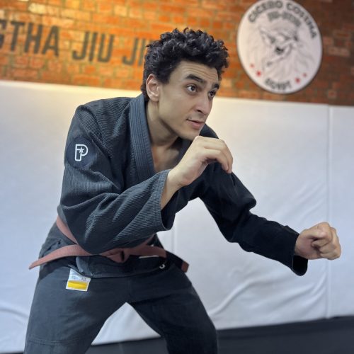 ATOM Jiu-Jitsu instructor teaching ground fighting techniques and submissions