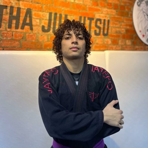 Experienced BJJ instructor at ATOM Jiu-Jitsu Academy, guiding students through advanced grappling techniques